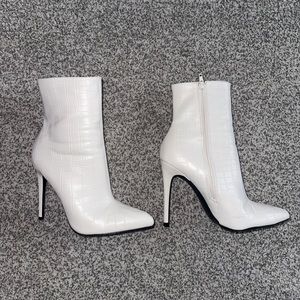 White heeled boots